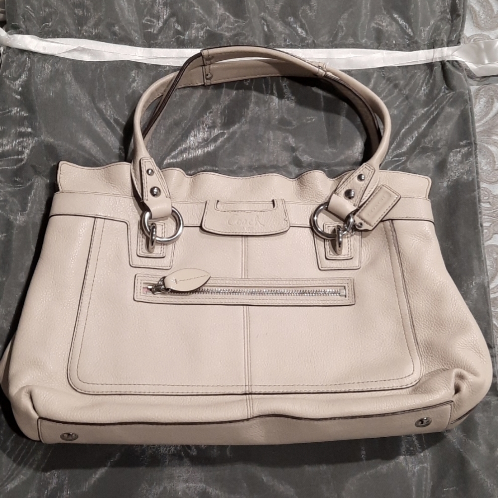Coach designer bag. Off white pink interior